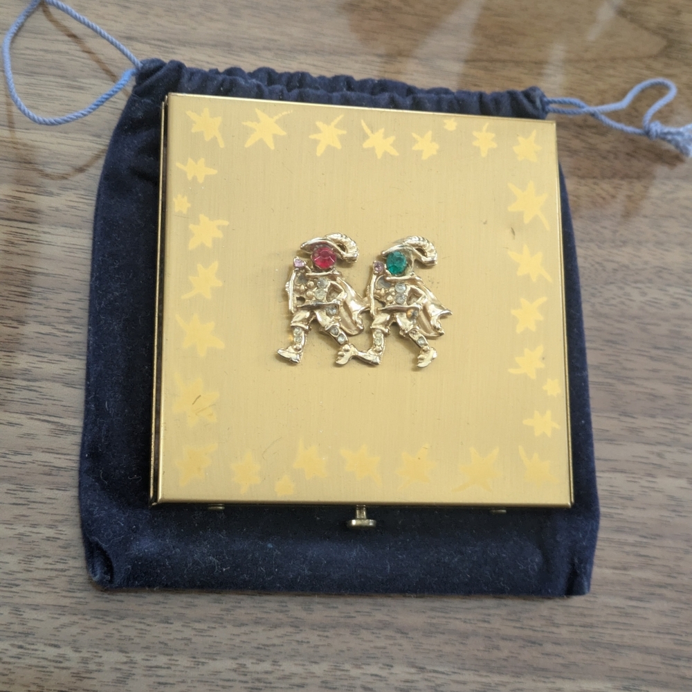 Gold Compact with Gemstone Accents